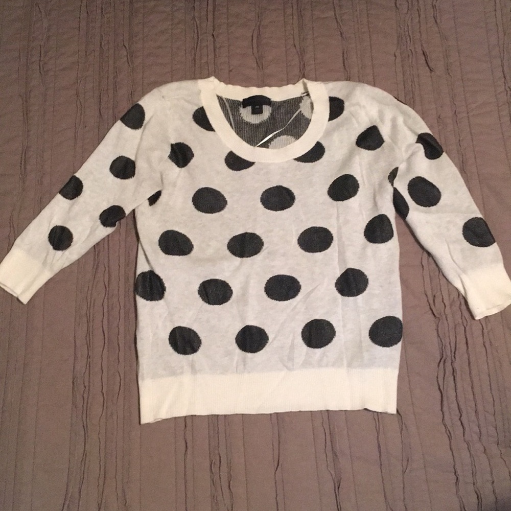 White and black sweater